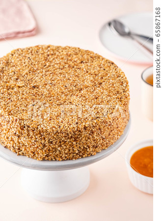 Cake with sesame seeds and apricot jam. Cake with sesame seeds and apricot jam. 65867168