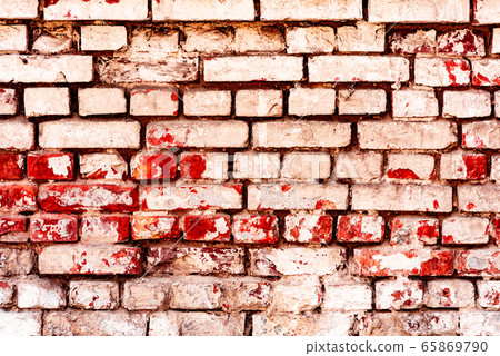 Texture of a brick wall with cracks and scratches Texture of a brick wall with cracks and scratches 65869790