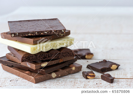 Different kinds of chocolates with nuts cocoa Different kinds of chocolates with nuts cocoa 65870806