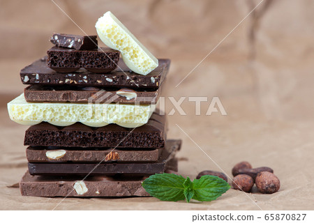 Different kinds of chocolates with nuts cocoa Different kinds of chocolates with nuts cocoa 65870827