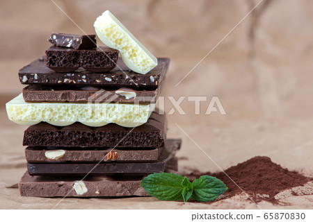 Different kinds of chocolates with nuts cocoa Different kinds of chocolates with nuts cocoa 65870830