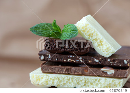 Different kinds of chocolates with nuts cocoa Different kinds of chocolates with nuts cocoa 65870849