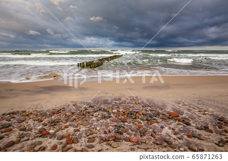 Baltic sea with wavebreaker 65871263