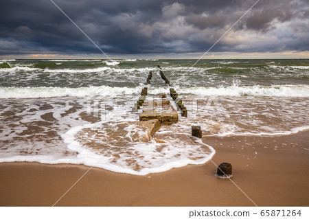 Baltic sea with wavebreaker 65871264