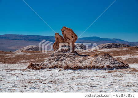 Salt figure in Atacama desert with clear blue sky Salt figure in Atacama desert with clear blue sky 65873855