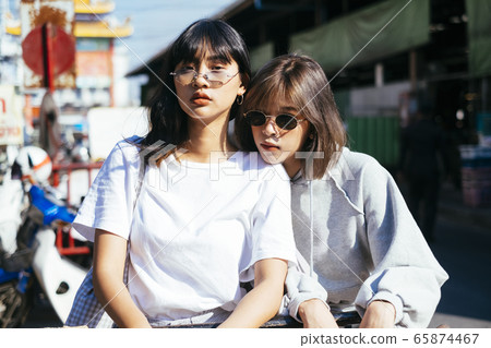 Thai girls at the market. Thai girls at the market. 65874467