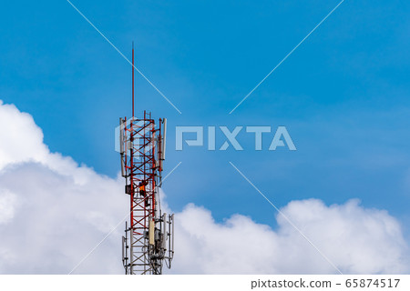Telecommunication tower with blue sky and white Telecommunication tower with blue sky and white 65874517
