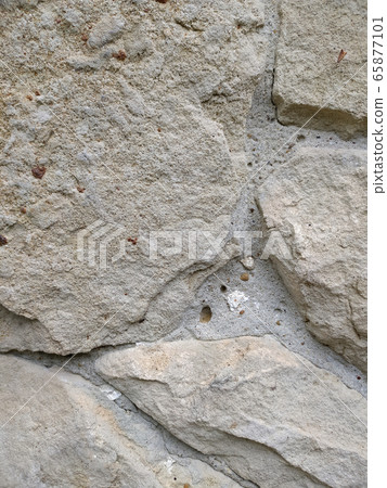 Gray stone wall background, mosaic stonewall 65877101