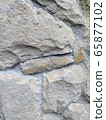 Gray stone wall background, mosaic stonewall 65877102