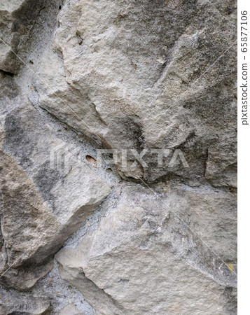 Gray stone wall background, mosaic stonewall 65877106
