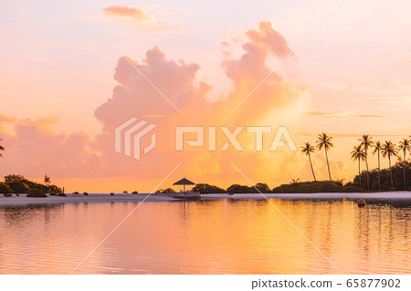 Perfect white beach with turquoise water at ideal island 65877902