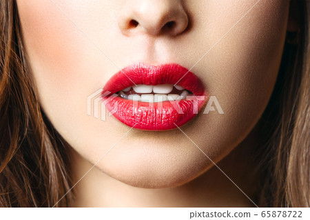 Sensual red Lip, mouth open. Beautiful Woman Portrait, close-up big Lips. Magnificent red ripstick on the lips 65878722