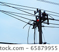 electrician man working at height and dangerous ,high voltage power line maintenance 65879955