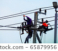 electrician man working at height and dangerous ,high voltage power line maintenance 65879956