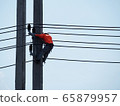 electrician man working at height and dangerous ,high voltage power line maintenance 65879957