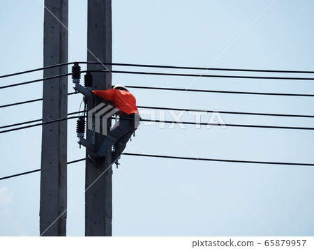 electrician man working at height and dangerous ,high voltage power line maintenance electrician man working at height and dangerous ,high voltage power line maintenance 65879957