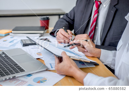 Two business team discussing and planning strategy 65880382