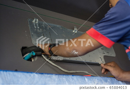 man install Air Conditioner Unit. man install Air Conditioner Unit. 65884013