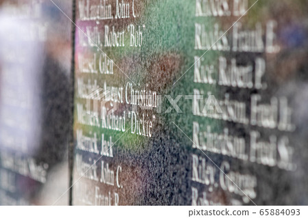 The wall of worker names from Mount Rushmore close up 65884093