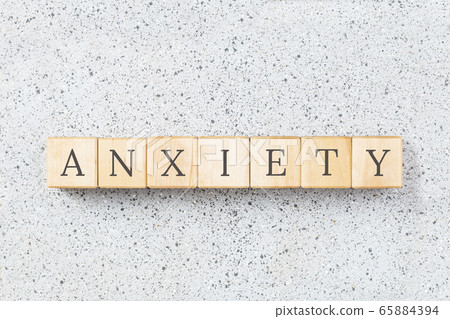 Anxiety word made with wooden blocks on grey 65884394