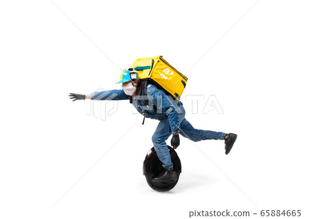 Too much orders. Contacless delivery service during quarantine. Man delivers food and shopping bags during isolation, wearing gloves and face mask. Too much orders. Contacless delivery service during quarantine. Man delivers food and shopping bags during isolation, wearing gloves and face mask. 65884665