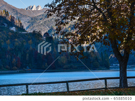 Autumn morning alpine Dolomites mountain lake Autumn morning alpine Dolomites mountain lake 65885010