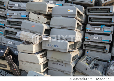 Pile of dot matrix printers on the landfill. 65885468