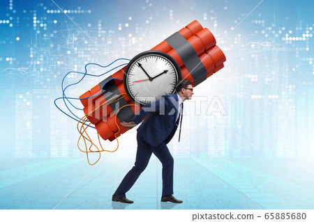 Desperate businessman with dynamite sticks 65885680