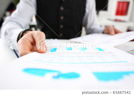 Man at home reviews and makes various report Man at home reviews and makes various report 65887542