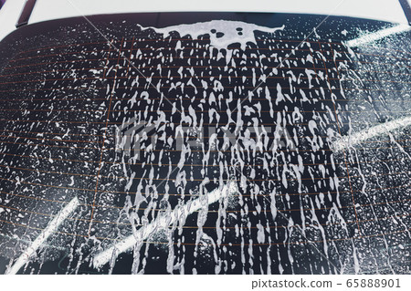 foam and soap on black background. abstract pattern. 65888901