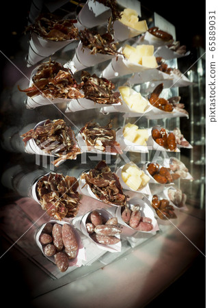 Paper cones filled with different sausage and Paper cones filled with different sausage and 65889031