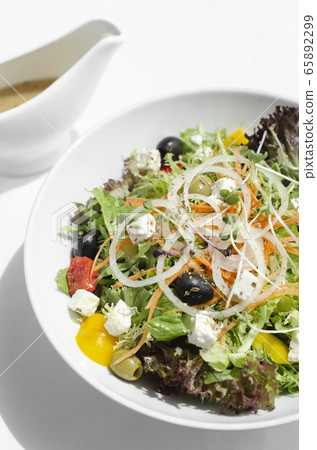 greek salad with feta cheese and olives with 65892299