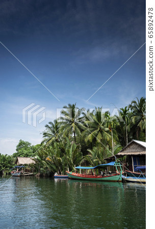 traditional jungle boat at pier on tatai river in 65892478