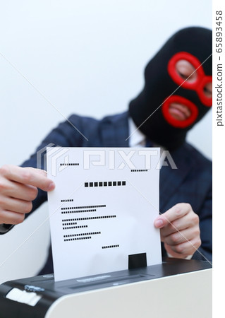 Shredder (criminal cover-up faceless copy space person electrical appliance suit male suspicious danger) 65893458
