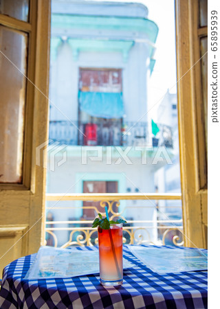 Cuban Havana restaurant colorful drinks 65895939