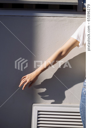 A hand of woman. 65896279