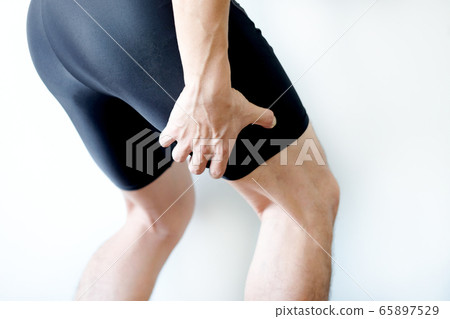 Leg pain .man stand hand caught at the leg. health concepts Leg pain .man stand hand caught at the leg. health concepts 65897529