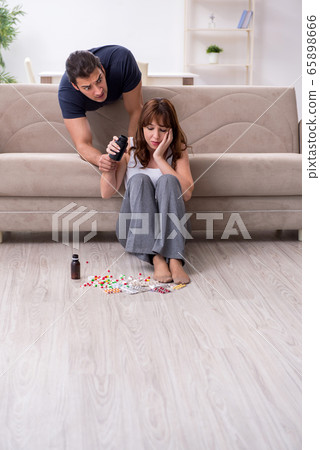 Young woman committing suicide after family conflict 65898666