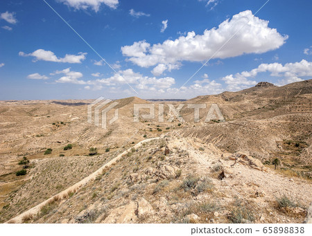 "Lunar" landscapes around the Matmata . 65898838