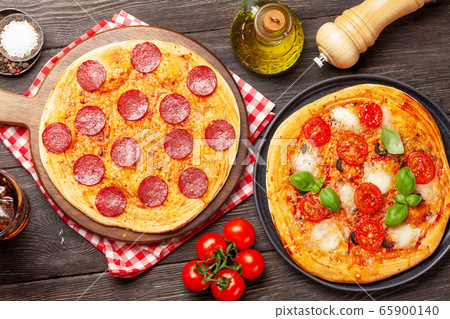 Various tasty homemade pizza Various tasty homemade pizza 65900140