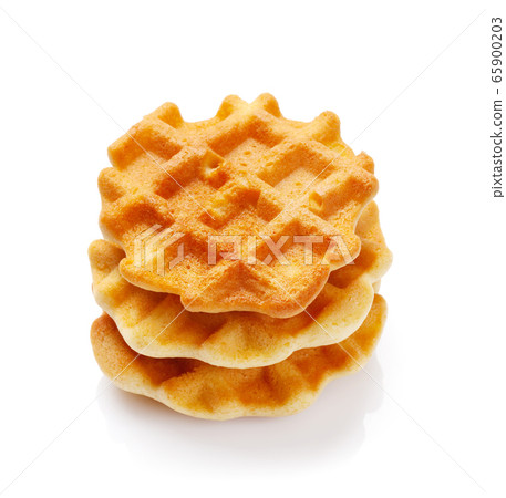 Delicious belgian waffles isolated on white Delicious belgian waffles isolated on white 65900203