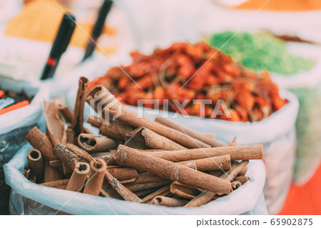 Dry Cinnamon Sticks, Condiment In Bags On Local Food Market, Bazaar. Dry Cinnamon Sticks, Condiment In Bags On Local Food Market, Bazaar. 65902875