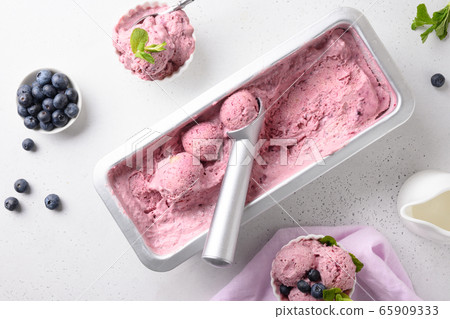 Blueberry homemade ice cream on white. Top view. Blueberry homemade ice cream on white. Top view. 65909333