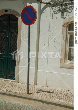 NO WAITING road sign and mansion facade in Campo Maior NO WAITING road sign and mansion facade in Campo Maior 65915700