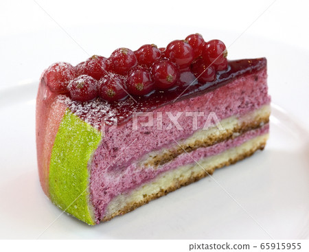 Piece of cake with fresh red currant. Piece of cake with fresh red currant. 65915955