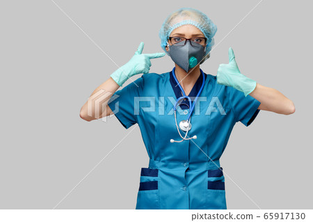 female doctor with stethoscope wearing protective mask and latex gloves over light grey background female doctor with stethoscope wearing protective mask and latex gloves over light grey background 65917130