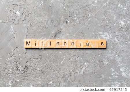 millennials word written on wood block. millennials word written on wood block. 65917245