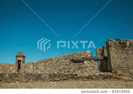 Iron cannon on the wall of stronghold next to the Marvao Castle 65918408