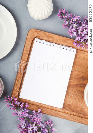 Lilac, marshmallow on wooden desk. Flat lay Lilac, marshmallow on wooden desk. Flat lay 65920179