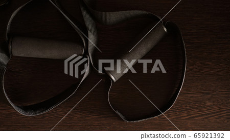 Closeup view of suspension training at home Closeup view of suspension training at home 65921392